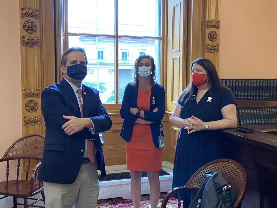 Reps. Jack Cera (D-Bellaire), Randi Clites (D-Ravenna) and Jessica Miranda (D-Forest Park) wait for House session to begin